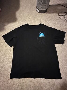 Loewe style Black Pocket Tee with Blue Splash Pocket Graphic